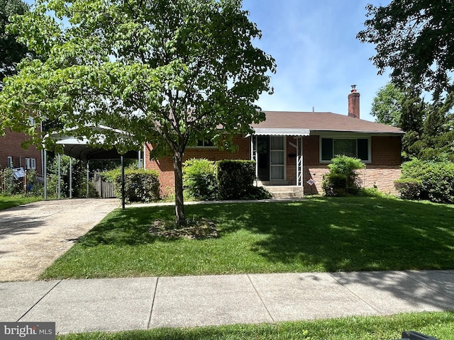 13012 Daley St, Silver Spring, MD 20906 - view of front facade featuring a front yard, a chimney, concrete driveway, brick siding, and a detached carport