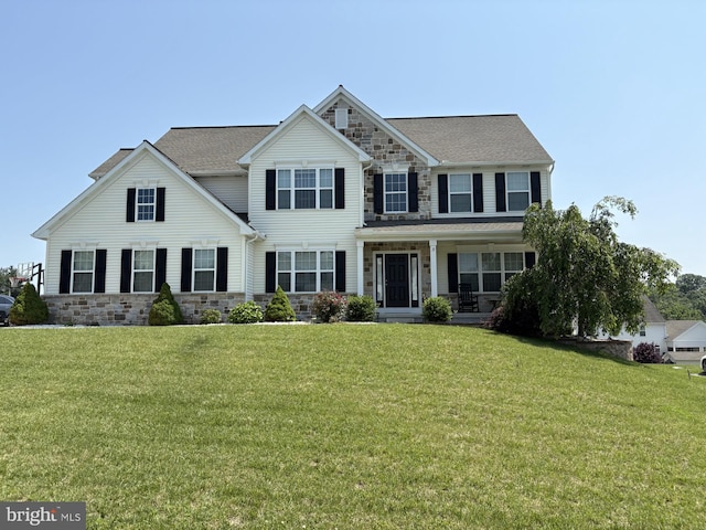 3 Rycroft Rd, Mechanicsburg, PA 17050 - view of front of home with stone siding, a porch, and a front lawn