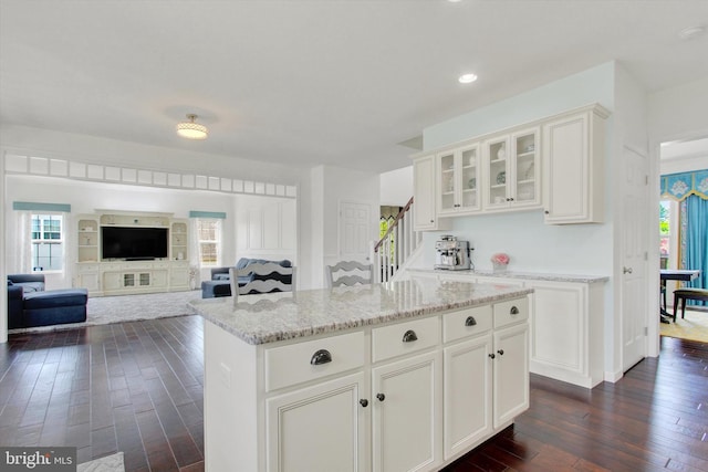 3 Rycroft Rd, Mechanicsburg, PA 17050 - kitchen featuring dark wood-type flooring, light stone counters, glass insert cabinets, white cabinetry, and recessed lighting
