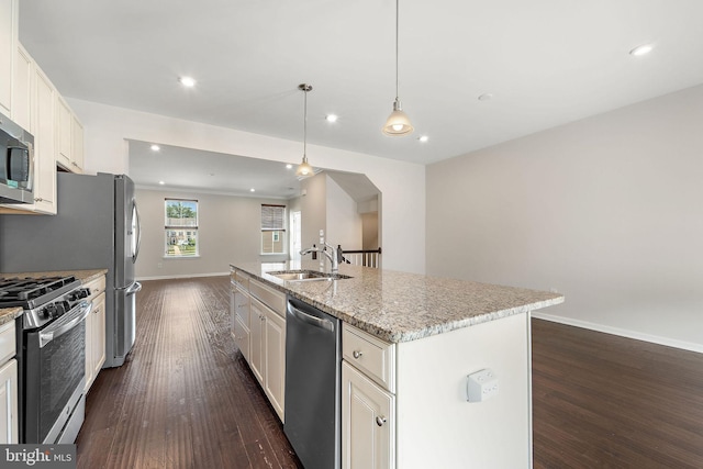 1307 Kohana Dr, Clarksboro, NJ 08020 - kitchen with stainless steel appliances, a sink, dark wood-style floors, baseboards, and a center island with sink