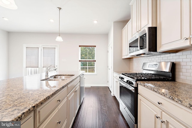 1307 Kohana Dr, Clarksboro, NJ 08020 - kitchen featuring stainless steel appliances, a sink, dark wood-style floors, tasteful backsplash, and light stone counters