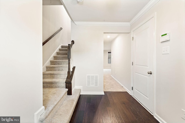 1307 Kohana Dr, Clarksboro, NJ 08020 - stairway featuring crown molding, wood finished floors, and baseboards