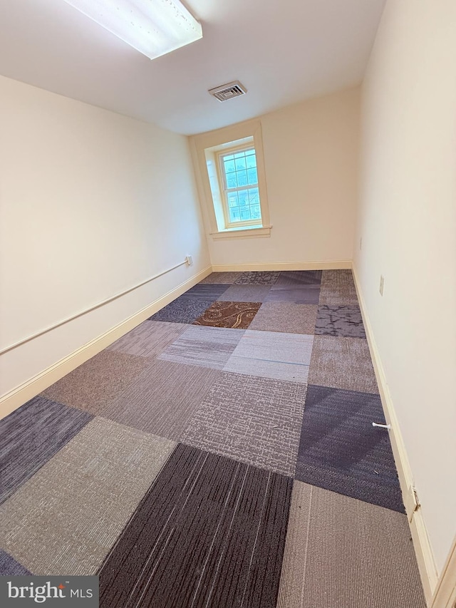 2410 Chichester Ave, Upper Chichester, PA 19061 - carpeted empty room with baseboards