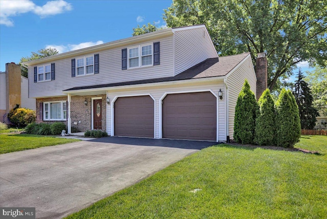 2110 Buckman Ave, Reading, PA 19610 - view of front of home featuring asphalt driveway, a front yard, and a chimney