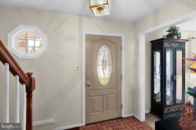 2110 Buckman Ave, Reading, PA 19610 - foyer with brick patterned flooring, baseboards, and wallpapered walls