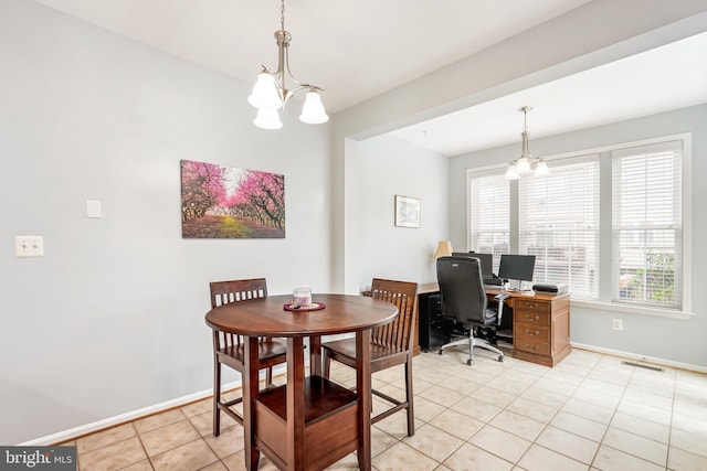 603 Howitzer Ter NE, Leesburg, VA 20176 - dining room with a chandelier, a desk, and light tile patterned flooring
