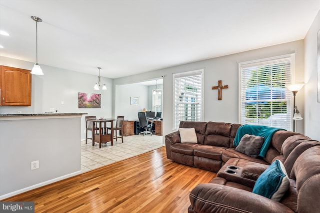 603 Howitzer Ter NE, Leesburg, VA 20176 - living room featuring light wood-type flooring and an office area