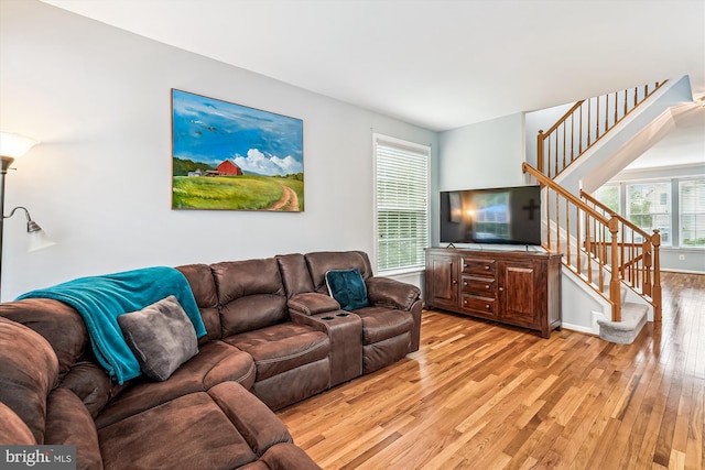603 Howitzer Ter NE, Leesburg, VA 20176 - living room featuring light wood finished floors and stairway