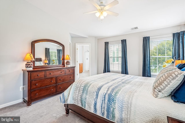 603 Howitzer Ter NE, Leesburg, VA 20176 - bedroom featuring light colored carpet and ceiling fan