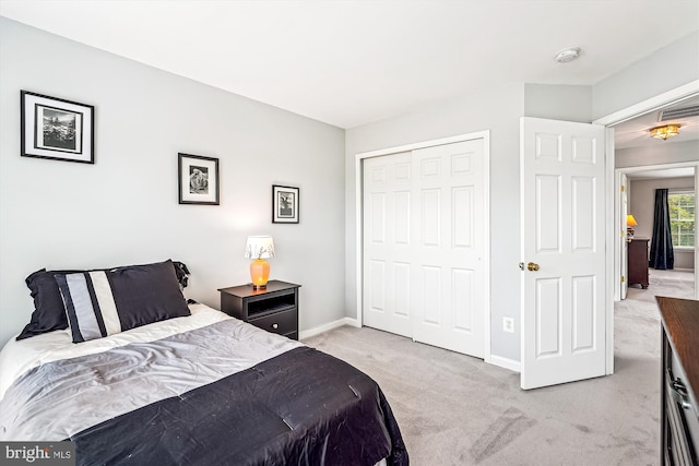 603 Howitzer Ter NE, Leesburg, VA 20176 - bedroom with light carpet and a closet
