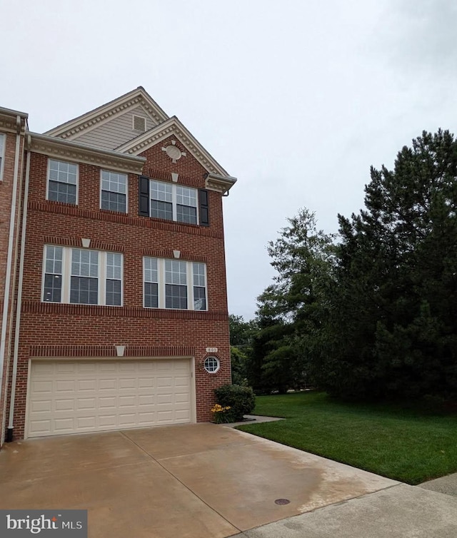 603 Howitzer Ter NE, Leesburg, VA 20176 - view of front of house with a garage, brick siding, driveway, and a front lawn