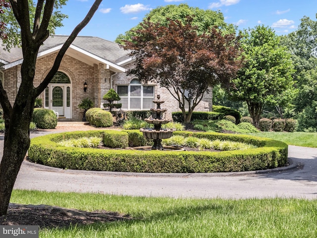 77 Lionheart Ter, Falling Waters, WV 25419 - view of front of home with brick siding