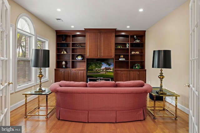 77 Lionheart Ter, Falling Waters, WV 25419 - living room with light wood-type flooring and recessed lighting