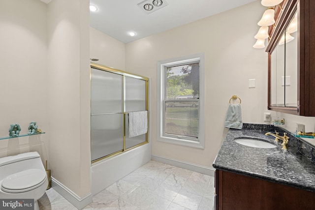 77 Lionheart Ter, Falling Waters, WV 25419 - bathroom with marble finish floors, vanity, and bath / shower combo with glass door