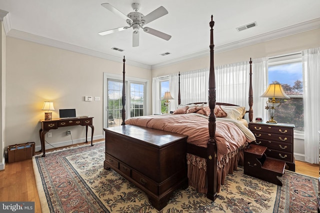 77 Lionheart Ter, Falling Waters, WV 25419 - bedroom featuring access to outside, light wood-style floors, ornamental molding, and a ceiling fan