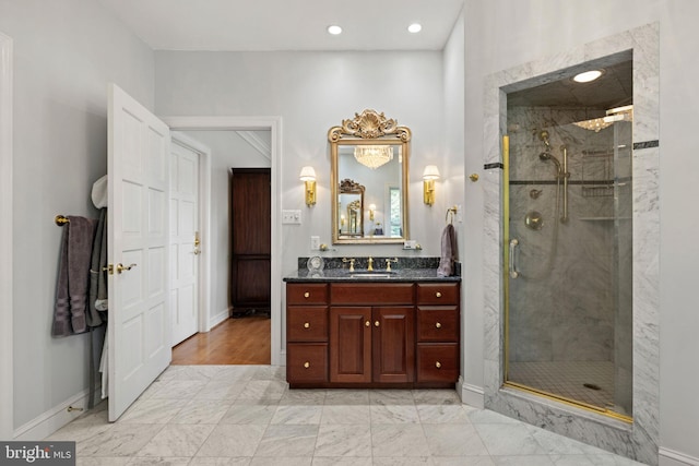 77 Lionheart Ter, Falling Waters, WV 25419 - full bathroom with vanity, a stall shower, marble look tile flooring, and recessed lighting
