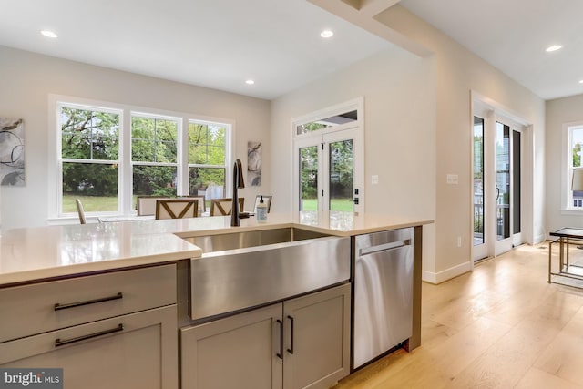 5809 2nd St S, Arlington, VA 22204 - kitchen featuring a sink, dishwasher, light countertops, gray cabinetry, and light wood-style flooring