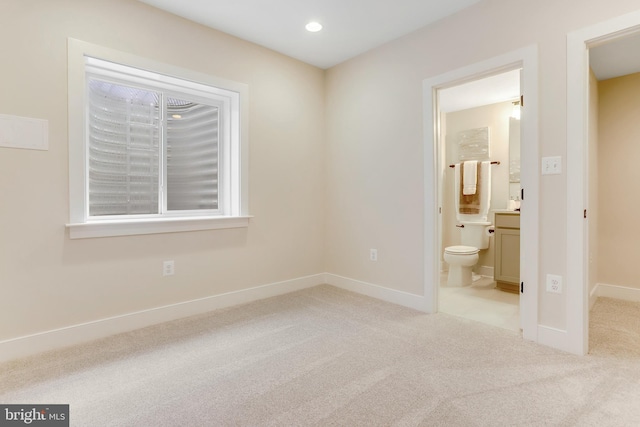 5809 2nd St S, Arlington, VA 22204 - unfurnished bedroom featuring carpet floors, baseboards, ensuite bath, and recessed lighting