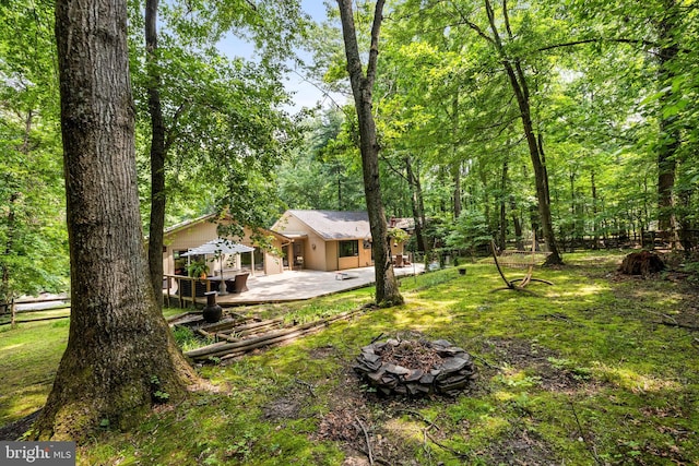 2404 Sugarberry Ct, Reston, VA 20191 - view of yard featuring an outdoor fire pit and a patio