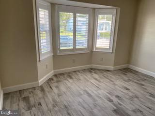 114 Mohican Ln, Tuckerton, NJ 08087 - unfurnished room with baseboards and wood finished floors