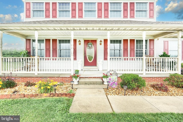 574 Mathias Rd, Littlestown, PA 17340 - view of exterior entry with a porch and a shingled roof
