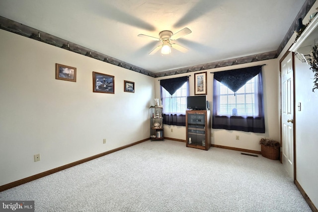 574 Mathias Rd, Littlestown, PA 17340 - empty room with light colored carpet and a ceiling fan