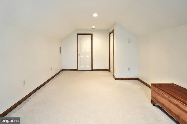 574 Mathias Rd, Littlestown, PA 17340 - additional living space with light carpet, vaulted ceiling, and recessed lighting