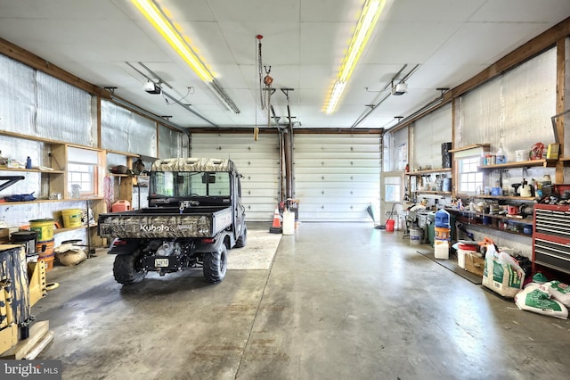 574 Mathias Rd, Littlestown, PA 17340 - garage featuring a workshop area and a garage door opener