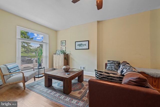 3004 E Pratt St, Baltimore, MD 21224 - living area featuring ceiling fan and wood finished floors