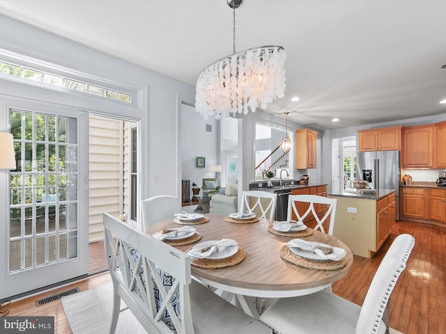 1 Lake Village Cir, Ocean View, DE 19970 - dining space featuring a chandelier, light wood-style floors, plenty of natural light, and recessed lighting