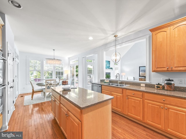 1 Lake Village Cir, Ocean View, DE 19970 - kitchen with a chandelier, a sink, light wood-style floors, dark stone counters, and recessed lighting