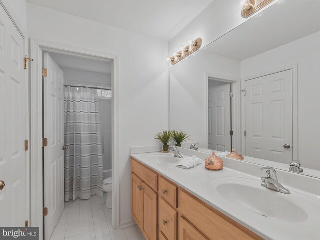 1 Lake Village Cir, Ocean View, DE 19970 - full bathroom with toilet, double vanity, tile patterned floors, and curtained shower