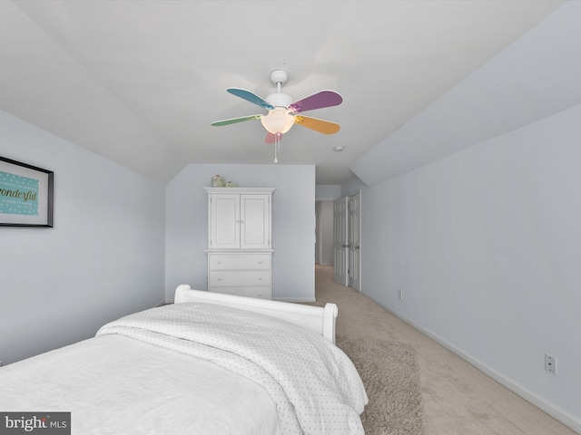 1 Lake Village Cir, Ocean View, DE 19970 - bedroom with light carpet, vaulted ceiling, ceiling fan, and baseboards