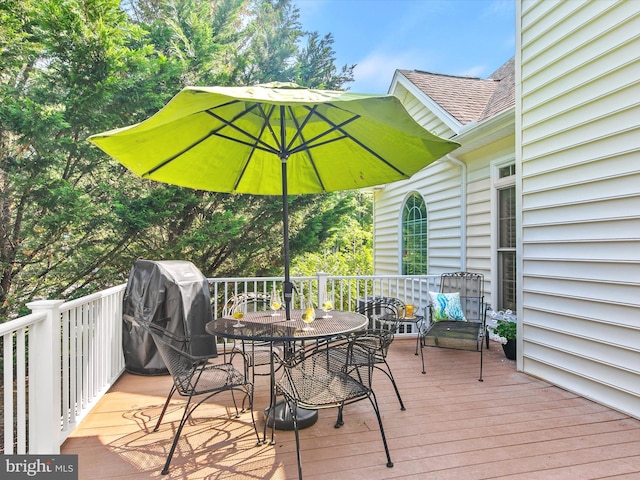 1 Lake Village Cir, Ocean View, DE 19970 - wooden terrace with grilling area and outdoor dining space
