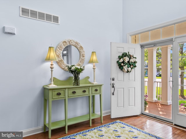 1 Lake Village Cir, Ocean View, DE 19970 - entryway featuring wood finished floors, a high ceiling, and baseboards