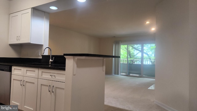 7705 Lafayette Forest Dr Unit 77, Annandale, VA 22003 - kitchen featuring stainless steel dishwasher, white cabinetry, light carpet, and recessed lighting