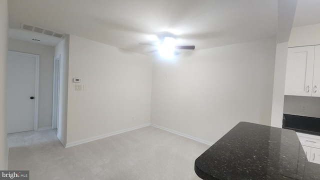 7705 Lafayette Forest Dr Unit 77, Annandale, VA 22003 - unfurnished dining area with light colored carpet and baseboards