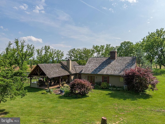 1621 Limekiln Rd, Limekiln, PA 19535 - view of front of house with a front yard and a chimney