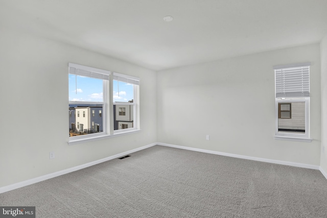 338 Ensemble Way, Frederick, MD 21701 - carpeted spare room with baseboards