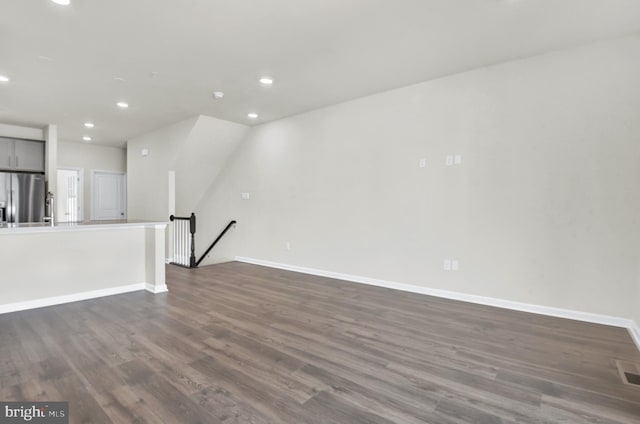 338 Ensemble Way, Frederick, MD 21701 - unfurnished living room featuring recessed lighting, dark wood finished floors, and baseboards