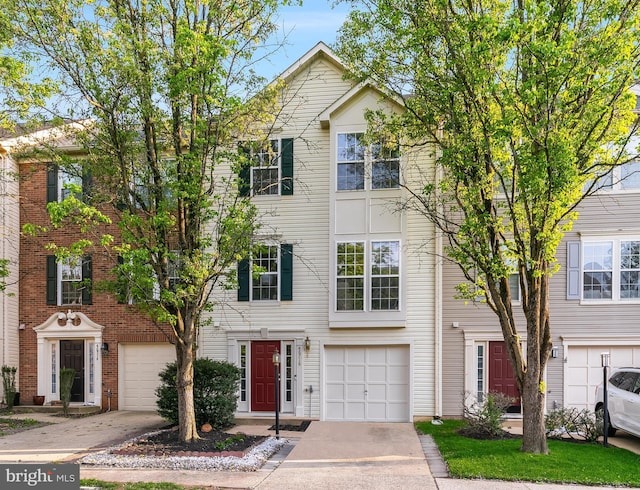 46716 Cavendish Sq, Sterling, VA 20165 - view of property featuring a garage and driveway