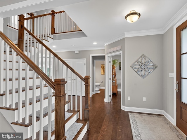 548 E Delp Rd, Lancaster, PA 17601 - entrance foyer with wood finished floors, crown molding, stairs, and recessed lighting