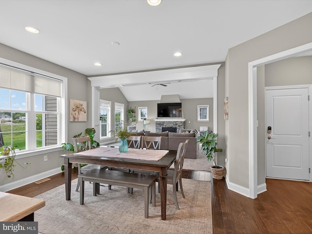 548 E Delp Rd, Lancaster, PA 17601 - dining space featuring a stone fireplace, wood finished floors, recessed lighting, and vaulted ceiling