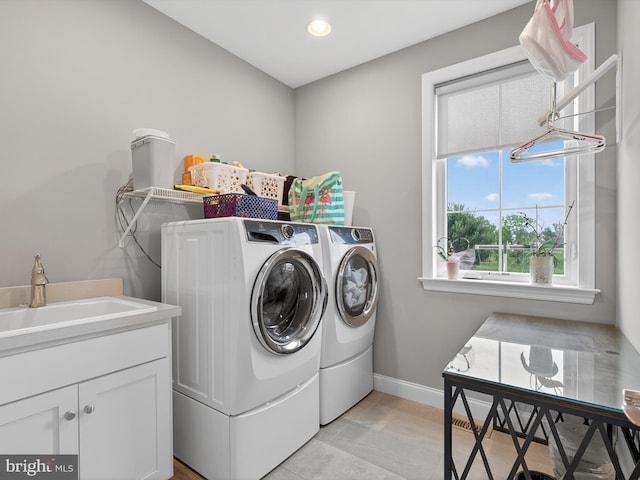 548 E Delp Rd, Lancaster, PA 17601 - laundry room with washing machine and clothes dryer, cabinet space, light tile patterned flooring, and recessed lighting