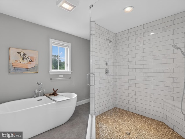 548 E Delp Rd, Lancaster, PA 17601 - bathroom with a stall shower, a freestanding bath, and recessed lighting