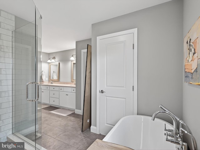 548 E Delp Rd, Lancaster, PA 17601 - full bath featuring double vanity, a freestanding bath, a stall shower, and tile patterned floors