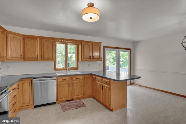 129 Deck Rd, Womelsdorf, PA 19567 - kitchen with dishwasher, a peninsula, healthy amount of natural light, and stove