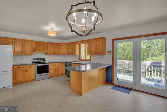 129 Deck Rd, Womelsdorf, PA 19567 - kitchen with appliances with stainless steel finishes, a peninsula, plenty of natural light, and a chandelier