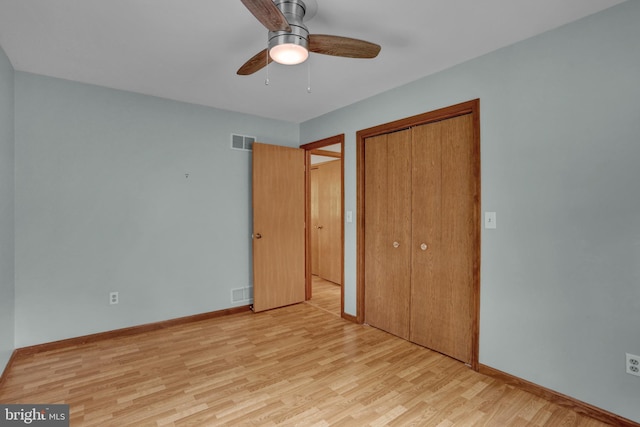 129 Deck Rd, Womelsdorf, PA 19567 - unfurnished bedroom with light wood-type flooring, a closet, and a ceiling fan