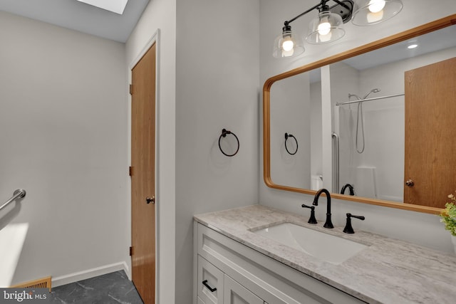 129 Deck Rd, Womelsdorf, PA 19567 - bathroom featuring vanity, a shower, and a skylight